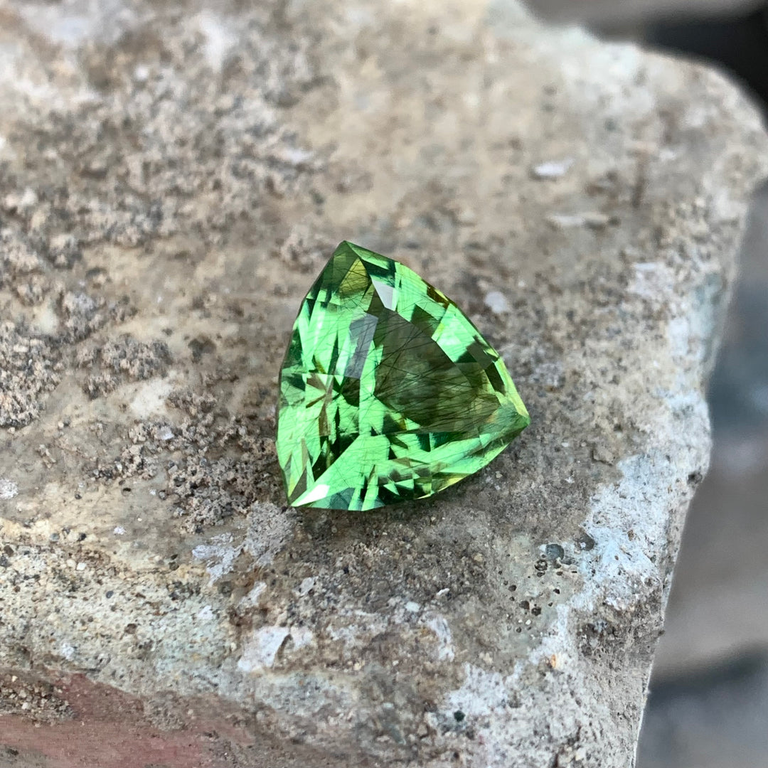 8.30 Carats Faceted Trillion Cut Rutile Peridot