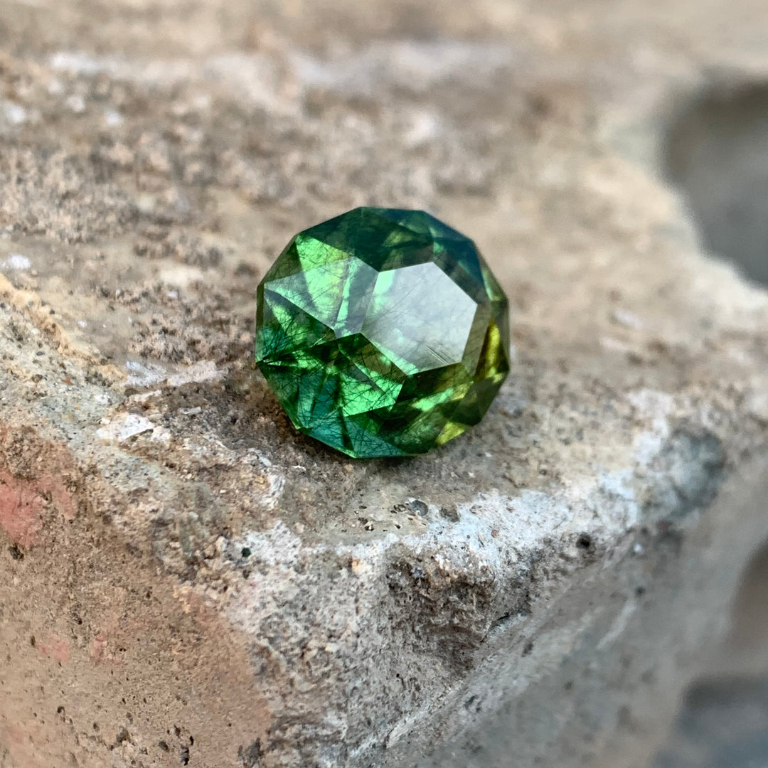 10.65 Carats Faceted Oval Cut Rutile Peridot