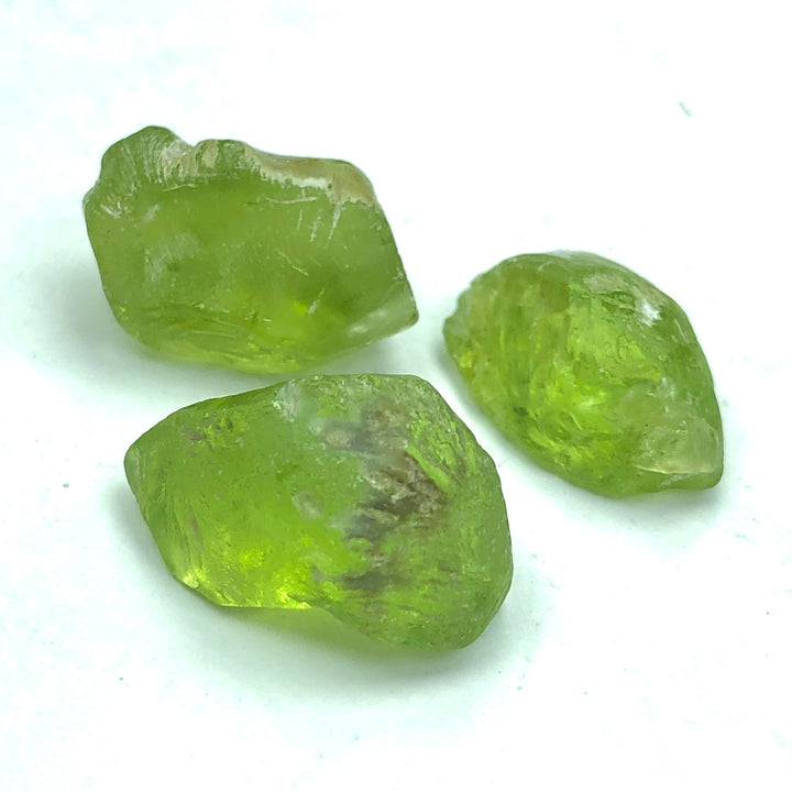 5.91 Grams Facet Rough Apple Greenish Peridots For Sale