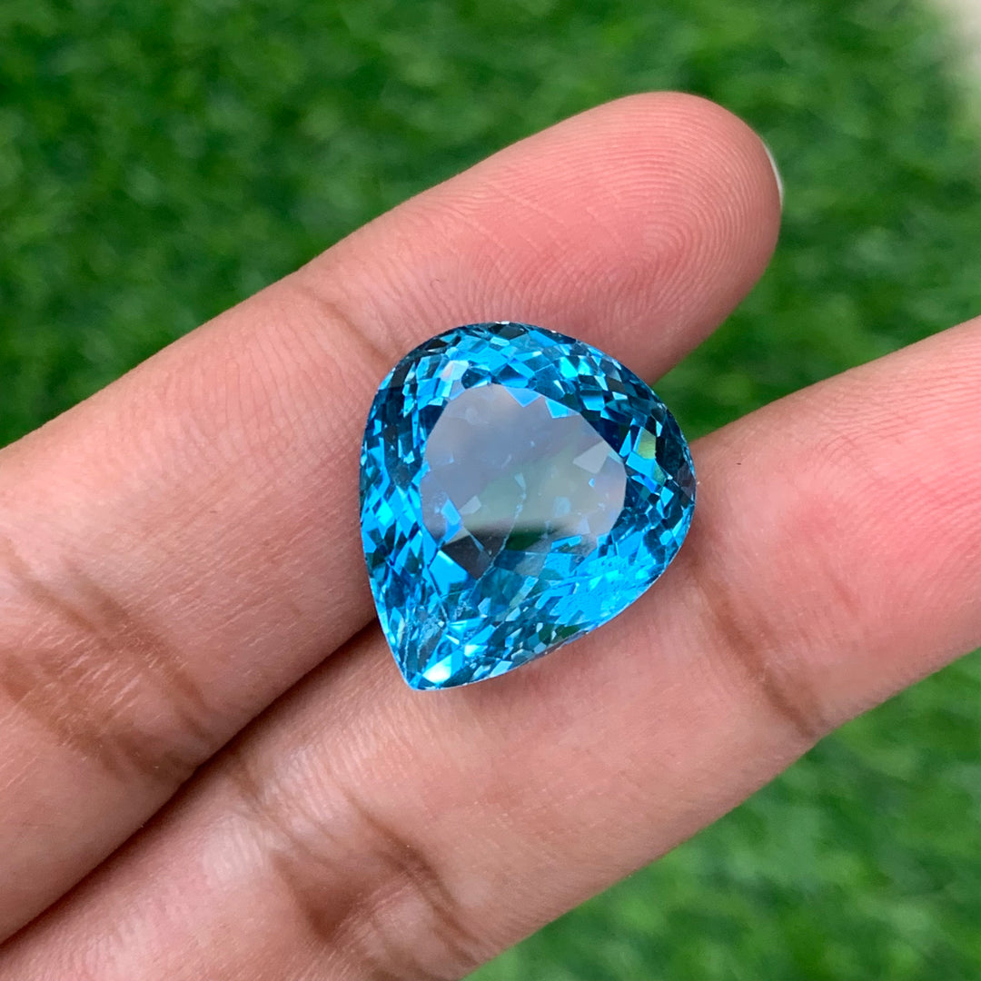 31.55 Carats Faceted Pear Shape Blue Topaz