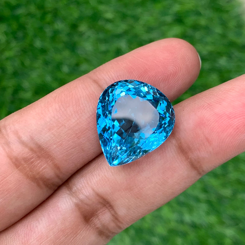 31.55 Carats Faceted Pear Shape Blue Topaz