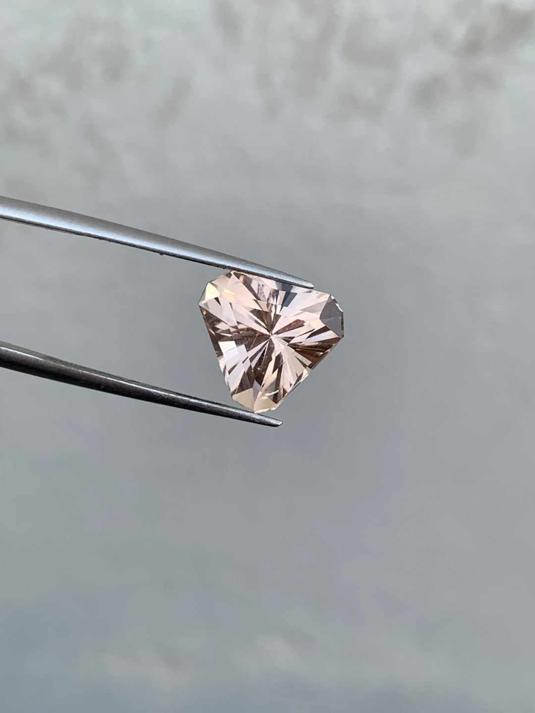 4.60 Carats Faceted Skardu Trillion Cut Peach Topaz