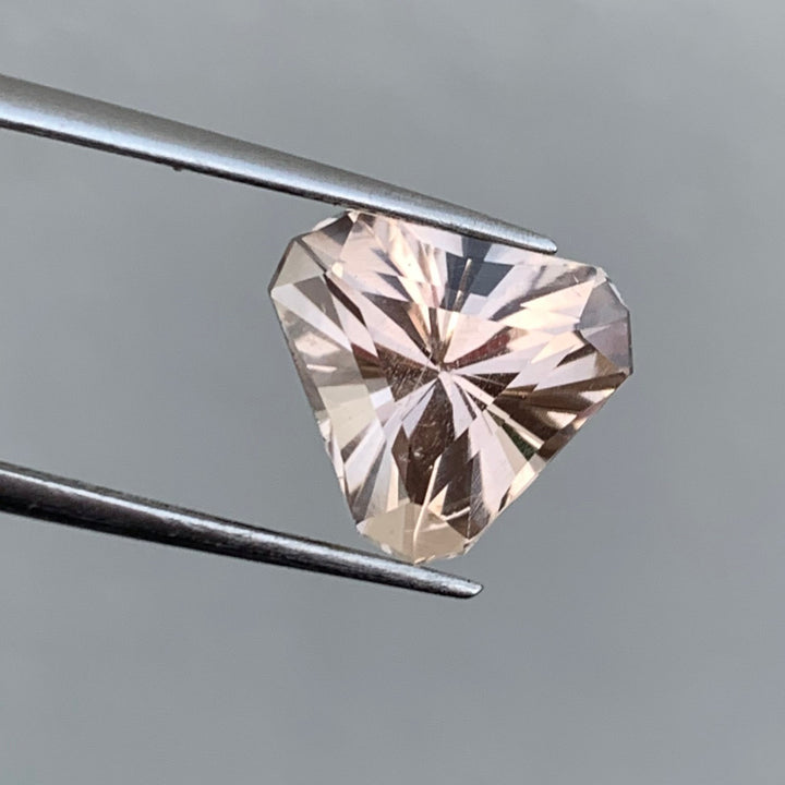 4.60 Carats Faceted Skardu Trillion Cut Peach Topaz