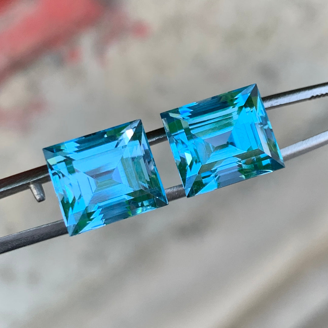 7.90 Carats Each Faceted Blue Topaz Pair